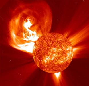 The Sun with a large plasma cloud which is just being ejected into space.