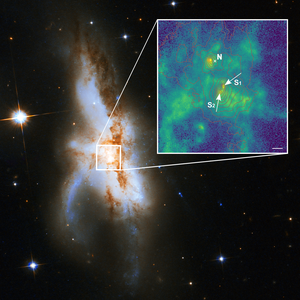 Hubble image of irregular Galaxy NGC 6240 with a zoom-in on its central region, which shows MUSE-data of three black holes.